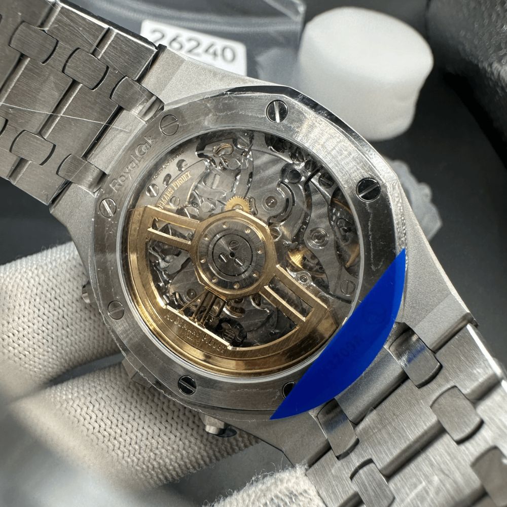 An AP Royal Oak super clone with a genuine-clone 3120 movement visible through the case back